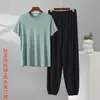 Nuevo traje casual de seda helada para hombre de verano, pantalones jogger de manga corta de verano, talla grande y holgada