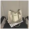 2025 Exportação Tendência Primavera Nova Bolsa de Ombro Feminina Moda Simples Versátil Bolsa de Mão Impermeável Bolsa de Couro PU