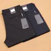 Calça casual de negócios masculina fina da série z para primavera e verão, fibra de poliéster, algodão elástico, lisa, não precisa passar, anti-rugas, reta