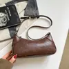 Bolso de axila Ruien de moda para mujer, nueva colección otoño 2026, nicho, elegante, casual y único bolso pequeño cuadrado de hombro