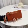 Bolso Bandolera para Mujer Piel Genuina 2026 Estilo Nuevo Mamá Piel Suave Moderno Versátil Billetera Larga Bolso Multifuncional para Teléfono