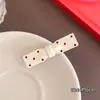 Estilo japonés y coreano, otoño e invierno, ondas simples, puntos, gotas de agua pequeñas, clip de pico de pato, flequillo simple que combina con todo, clip de borde, nicho, tocado exquisito