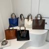 Nuevo bolso de mano casual portátil de textura simple de color sólido de gran capacidad estilo coreano 2024 para mujer