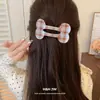 Pinza para el pelo ovalada geométrica de acrílico estilo coreano con lunares, con un diseño único y elegante, perfecta para uso casual, para ir al trabajo y como accesorio versátil para el cabello.