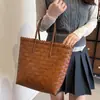 Bolsa de mano tejida nueva de primavera 2026 Bolsa con nudo de bambú Bolso de mano simple vintage Bolsa de compras de gran capacidad Bolsa tejida