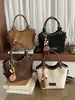 Bolso cruzado de nicho nuevo transfronterizo 2026, simple y elegante, bolso de mano vintage de moda, bolso casual de moda para mujer