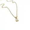 [Acero de titanio] Versión coreana de lujo ligero estilo frío micro incrustación de circonita letra colgante cadena de clavícula de acero de titanio joyería al por mayor