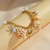 Nuevo brazalete de aleación con perlas, conchas, estrellas de mar y caracolas, estilo bohemio europeo y americano, para playa, brazalete de nicho