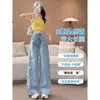 Jeans rasgados estilo americano para mujer, súper populares para el verano 2026, talla petite, parche lateral, pantalones acampanados desgastados