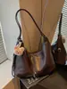 Bolso de Hombro Casual Transfronterizo para Mujer Otoño/Invierno 2026 Nuevo Estilo Moda para Viajes Cotidianos Bolso de Axila Gran Capacidad Bolso Bandolera de un Solo Hombro