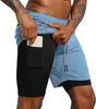 Venda direta da fábrica shorts esportivos de marca moderna de camada dupla, transpiráveis e de secagem rápida para homens, shorts esportivos de verão de comprimento 3/4 de secagem rápida para fitness