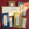 Capas especiais de papel feitas sob medida com páginas internas impressas para pinturas antigas, caligrafia, porcelana, pedras preciosas, jade, vinho e pedras únicas, juntamente com certificados de mestres artesãos especializados em cerâmica de argila roxa
