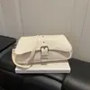 Bolso cuadrado pequeño de alta gama popular de diseño nicho nuevo para el verano de 2026, versátil, moderno, de tendencia, de un solo hombro cruzado