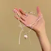 Collar Refrescante de Fresa con Lazo de Perlas Artificiales de Verano, Joyería de Lujo Ligero Rosa Nicho Dulce y Elegante Estilo Fresco para Mujeres