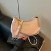 Bolso de axila versátil de moda diaria estilo coreano transfronterizo, nuevo modelo de verano 2026, bolso de hombro cruzado de alta gama