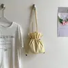 Bolso tipo cubo ligero con cordón de nailon estilo coreano Ins Modelo Nuevo 2026 Moda Transfronteriza Versátil Bolso de Hombro Moderno