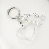 Ins Coreano Dulce Chica Cadena de Corazón Plateado con Lazo Colgante para AirPods Llavero de Chica Decoración Colgante para Bolso