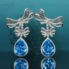 Diseño original, industria pesada, lujo ligero, lleno de diamantes, traje azul Topa, collar con lazo de hada súper, pendientes de botón con tesoro colorido, anillo para mujer