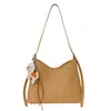 Bolsa de Mão Textura Tecida de Nicho Transfronteiriça Bolsa Baguete Feminina Moda Outono Inverno 2025 Simples Retrô Para o Trabalho Ombro Subarmela
