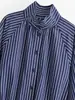 Venta al por mayor transfronteriza de moda casual de trabajo para mujer europea y americana nueva de 2026, camisas de manga larga con cuello alto y cordón a rayas