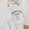 2026 Verão Novo Estilo Gravata Borboleta Versátil Estilo Coreano Desenho Animado Gravata Borboleta Camiseta de Manga Curta Top Feminino