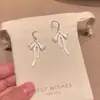 Pendientes de Lazo de Cinta Esmaltados en Blanco Dulces y Elegantes Estilo Francés para Mujer, Lujo Ligero, Gama Alta, Pendientes Versátiles