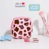 Bolsa de Cosméticos Portátil Personalizada com Estampa de Vaca Rosa Laser Nicho Doce e Cool Estilo Girly Armazenamento de Beleza Portátil Necessaire