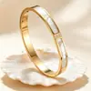 Pulsera de moda de lujo ligero transfronteriza europea y americana, chapada en oro de 18 quilates, incrustada de diamantes, no se decolora, regalo, accesorio diario