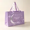 Sacos de papel de pequena tiragem Yiwu feitos sob medida sacolas de compras de papel para roupas femininas sacolas de presente de alta qualidade feitas sob medida para lojas de roupas corporativas sacolas de presente