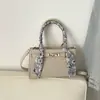 Bolso de mujer muy elegante, nuevo modelo de verano 2026, bolso de mano pequeño cuadrado simple y chic, bolso de hombro, bolso cruzado, bolso para el trabajo