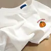 Camiseta de Manga Corta de Algodón Puro Estilo Europeo para Mujer, Nuevo Estilo Verano 2025, Corte Holgado, Adelgazante, Hombro Normal, Cuello Redondo, Top Camiseta Base Blanca