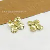 Novos botões decorativos de flor de metal com senso de alta qualidade atacado acessórios de botão para casaco suéter terno