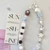 Lanyard de verano para teléfono móvil, colgante fresco estilo ins, colgante de cuentas, cadena de teléfono con cámara ccd, cadena