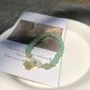 Pulsera popular de ópalo de imitación transfronteriza diseño de nicho ins femenino Estrella de cinco puntas de cristal luz de luna gris pulsera de moda para estudiantes