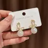 Pendientes de Perla de Sirena con Lazo para Mujer 2026 Nuevo Diseño Pequeño de Nicho Pendiente Colgante Temperamento de Gama Alta Pendiente de Lujo Ligero