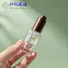 En Stock Botella de Vidrio Transparente de 8 ml con Hombro Redondo y Fondo Grueso Botella para Aceite Esencial Botella para Dispensar Muestras de Sérum con Bomba Gotero Redonda Recta