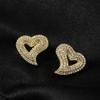 Pendientes de amor huecos circulares Cao Shi Duo, pendientes de hip-hop de alta gama, estilo retro europeo y americano, pendientes personalizados exagerados.