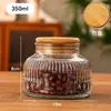 Pote Selado com Relevo Vintage Garrafa de Barriga Grande Pote Redondo Doméstico para Armazenamento Embalagem de Grãos Garrafa de Vidro Transparente Garrafa Vazia Venda por Atacado
