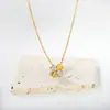 Collar Colgante de Cuatro Hojas de Trébol con Diamantes Goteo de Aceite Europeo y Americano Moda Cadena para Clavícula de Acero Inoxidable de Alta Gama Venta al por Mayor