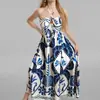 Ropa Femenina Transfronteriza Europea y Americana Nueva 2026: Vestido Estampado de Lujo y Sofisticado con Cuello Cruzado y Espalda Descubierta