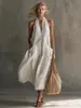 Vestido Midi de Alça Vintage Europeu e Americano Amazon Feminino para Férias com Decote V e Bolsos na Frente Estilo Férias Vestido de Alça