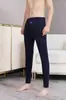 Calças quentes de veludo de camelo outono e inverno cintura alta forradas com fleece grossas long johns masculinas e femininas de casal alta elasticidade cor sólida aquecimento calça de baixo de algodão
