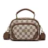 Bolsa de Luxo 2025 Nova Moda Estampada Pequena Redonda Atmosférica Ombro Único Transversal Bolsa Feminina
