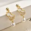 Brincos de Casca de Cabacinha Estilo Étnico Chinês Design de Nicho Elegante de Alta Qualidade Zircônia Incrustada com Pérola Brincos Pendentes de Personalidade