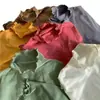 Top base de manga larga de alta gama para mujer, otoño e invierno, elástico, con estilo relajado, caracterizado por un dobladillo con volantes y una textura suave y afelpada.