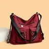 Moda transfronteriza fabricantes de comercio exterior al por mayor explosiones estampado de letras moda simple bolsa de mano para mujer hombro diagonal mochila