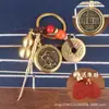 Llavero Zodiacal de Latón Cadena Decorativa Giratoria Juego de Cuatro Piezas con Cuerda de Nube Auspiciosa Vintage de Cinabrio y Monedas de los Cinco Emperadores para la Buena Fortuna