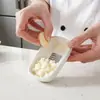 Molino de ajo al por mayor transfronterizo, rallador manual de jengibre, rallador de wasabi y mostaza, herramienta de cocina para triturar jugo de jengibre
