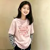 Camiseta de manga larga de dos piezas de imitación para niñas 2026 primavera/otoño elegante camiseta básica de algodón puro para niños mayores