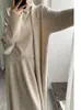 Conjunto de Tres Piezas de Punto de Longitud Media Estilo Coreano Otoño e Invierno Suéter de Cuello Alto de Alta Gama Cardigan Falda Traje Transfronterizo para Mujer